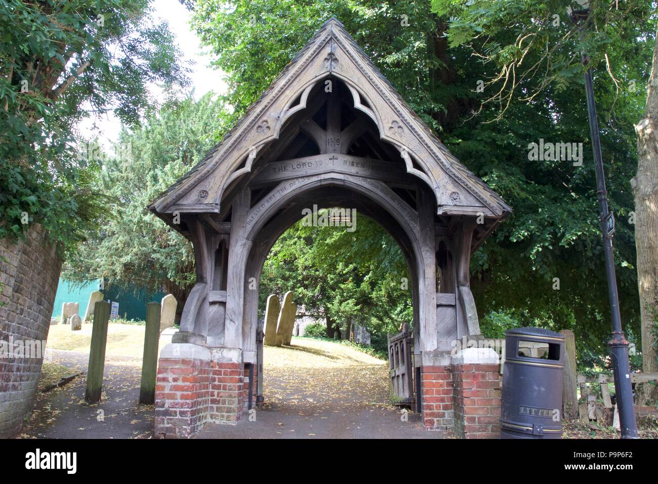 St Mary's Church of England lychgate on Harrow-On-The-Hill, London. A lychgate is a gateway covered with a roof found at the entrance to a churchyard Stock Photo