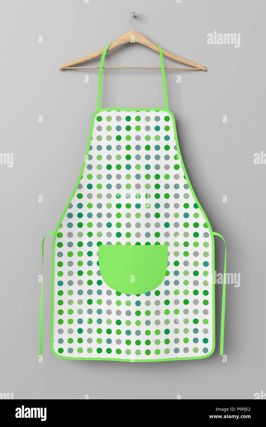 Blank green polka dot apron with pocket on hanger isolated with ...