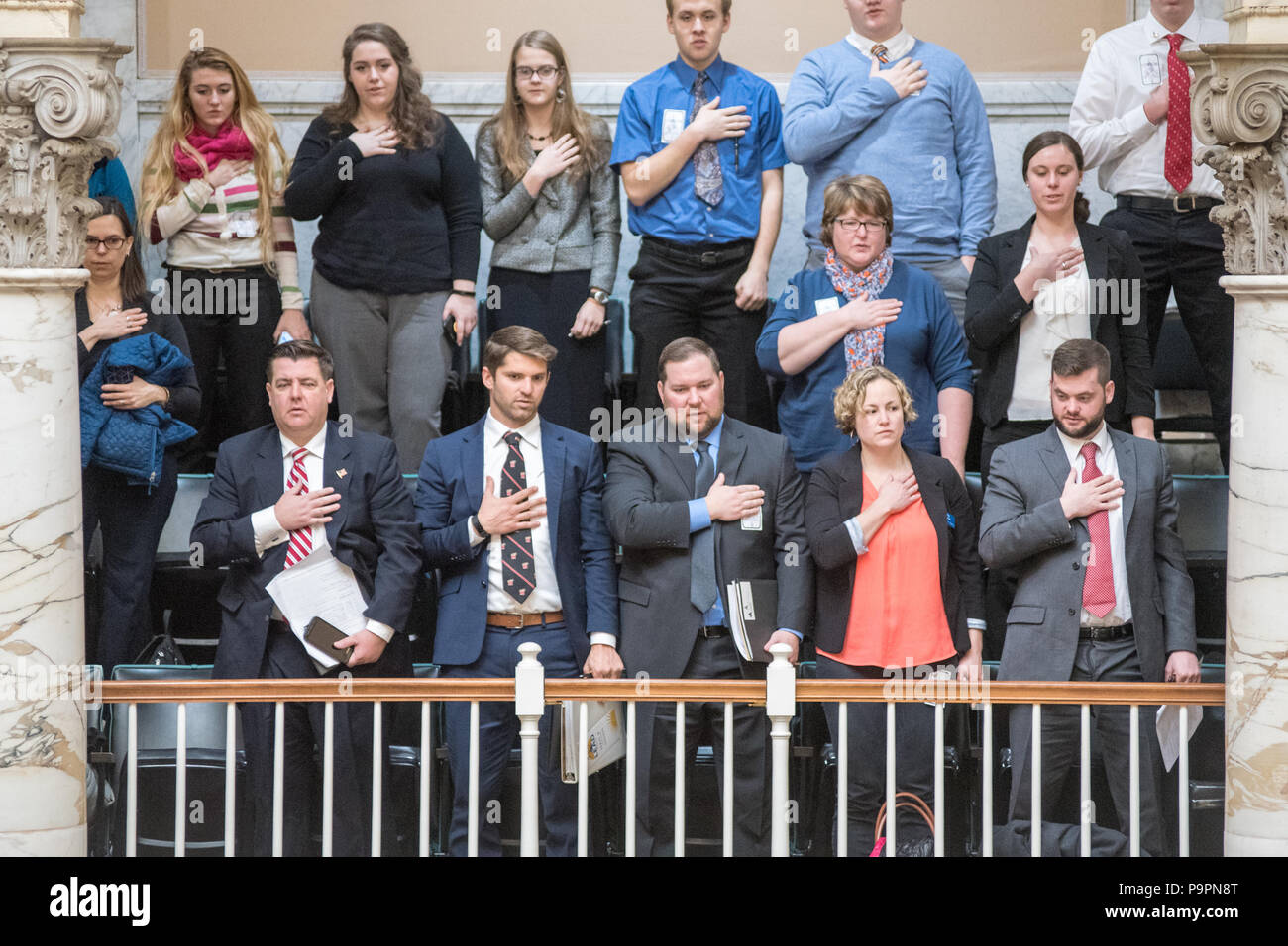 Group of people stand up for the national anthem inside the Maryland State House, Annapolis, Maryland Stock Photo