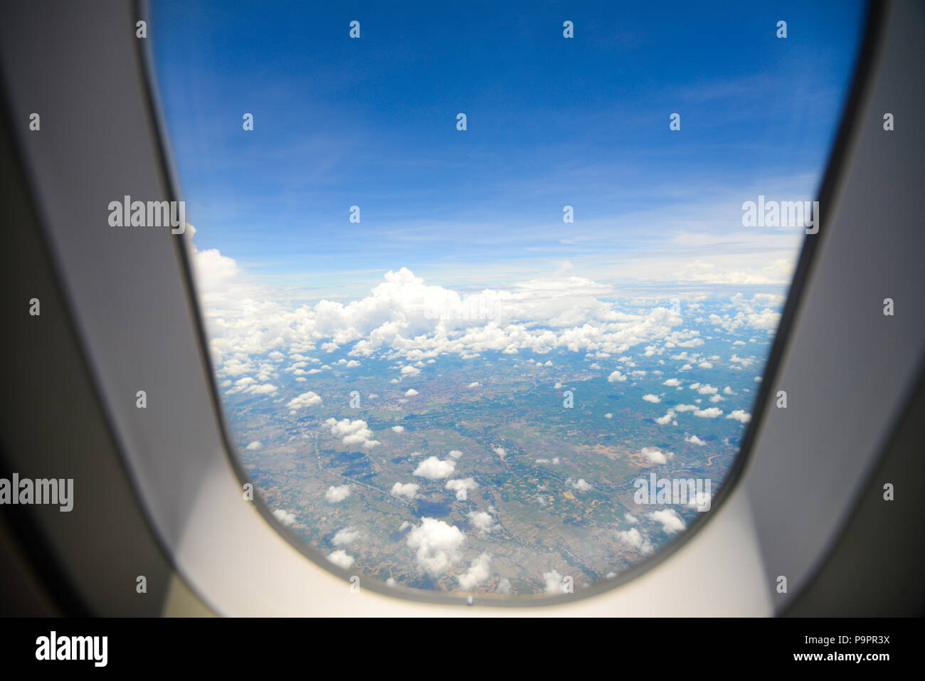 Beautiful view of blue sky above the white clouds and land background ...