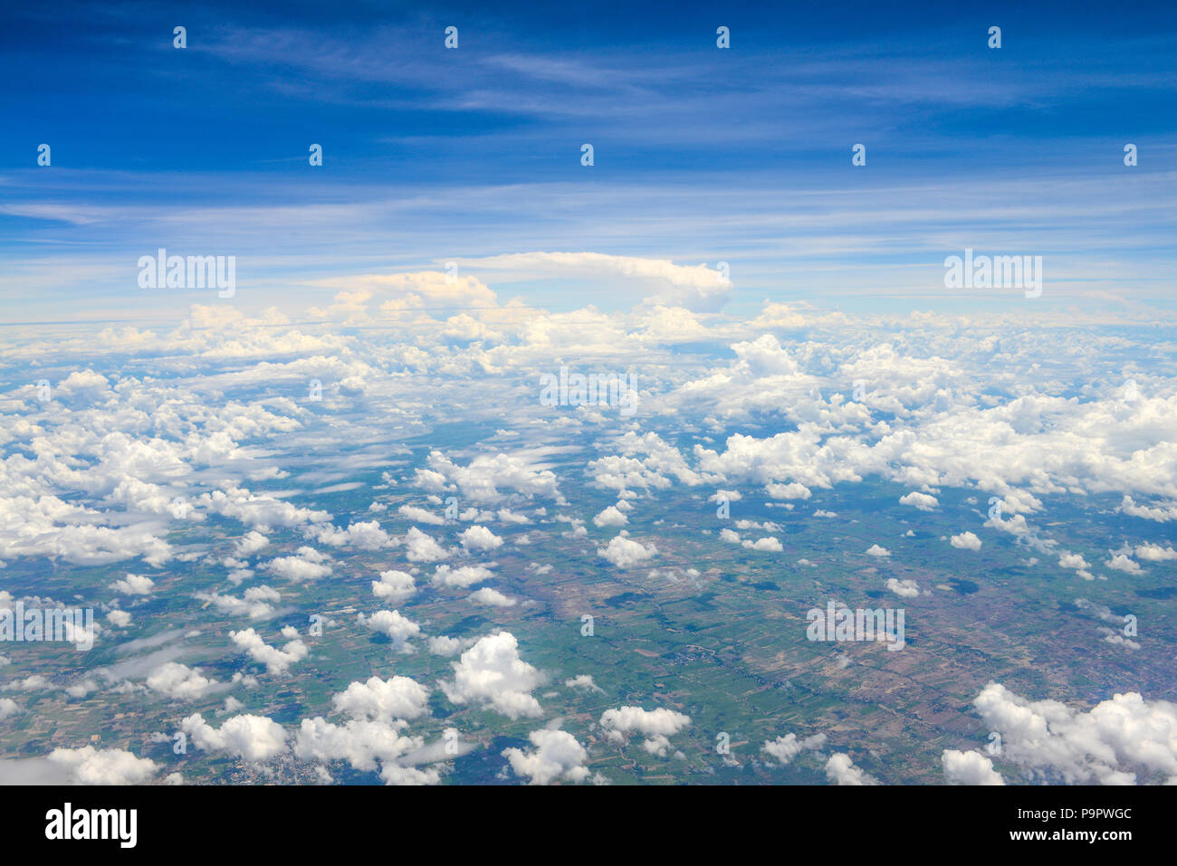 Beautiful view of blue sky above the white clouds and land background ...