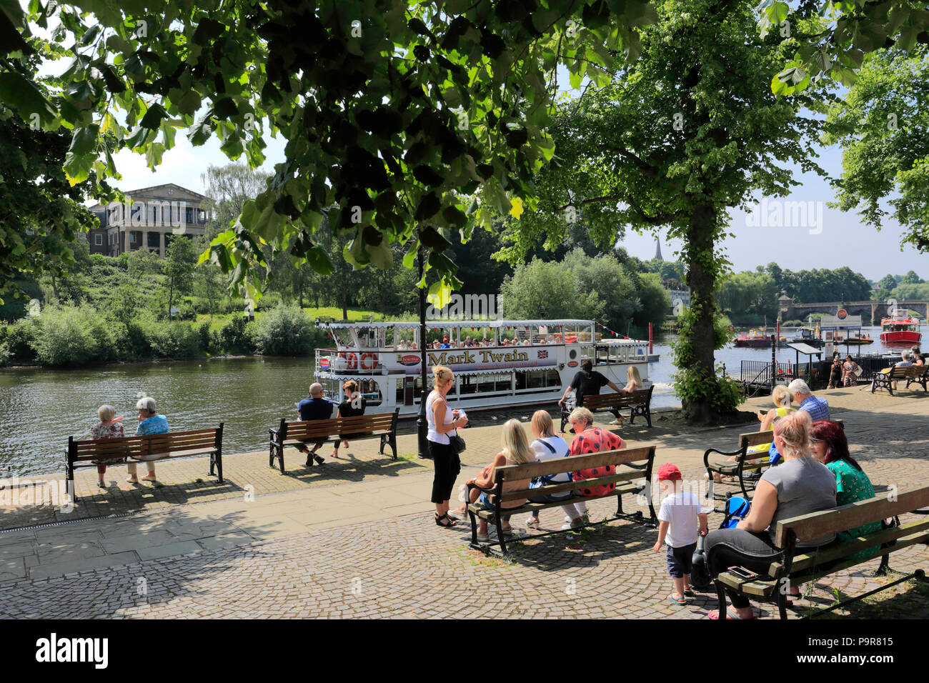 People and boats at the River Dee Embankment, Chester City, Cheshire, England Stock Photo