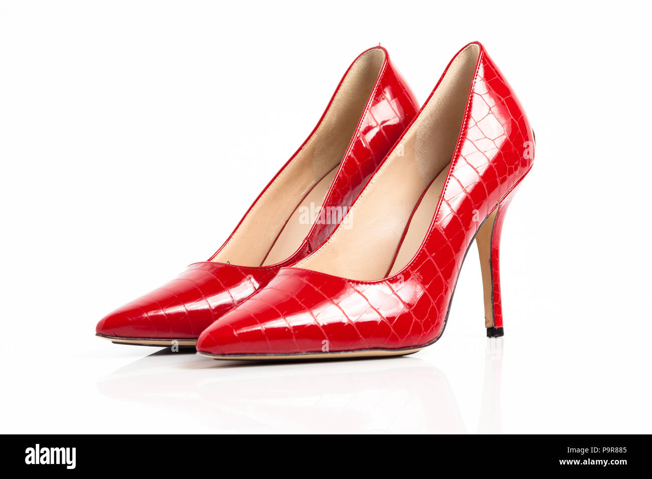 Red high heel shoes isolated on a white background Stock Photo - Alamy