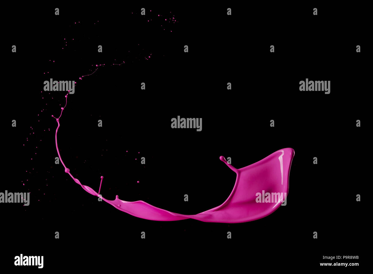 Colored splashes in abstract shape, isolated on black background. Stock Photo