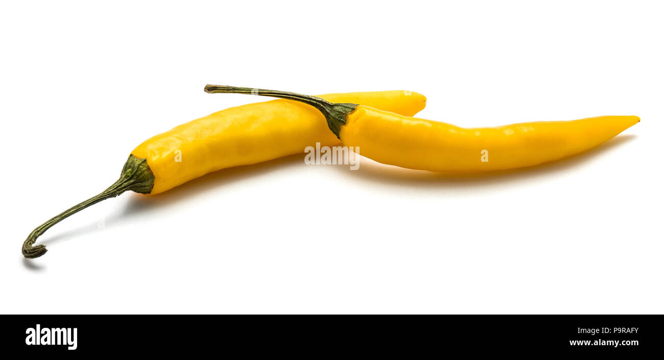 Pair of yellow Chili peppers isolated on white background Stock Photo ...