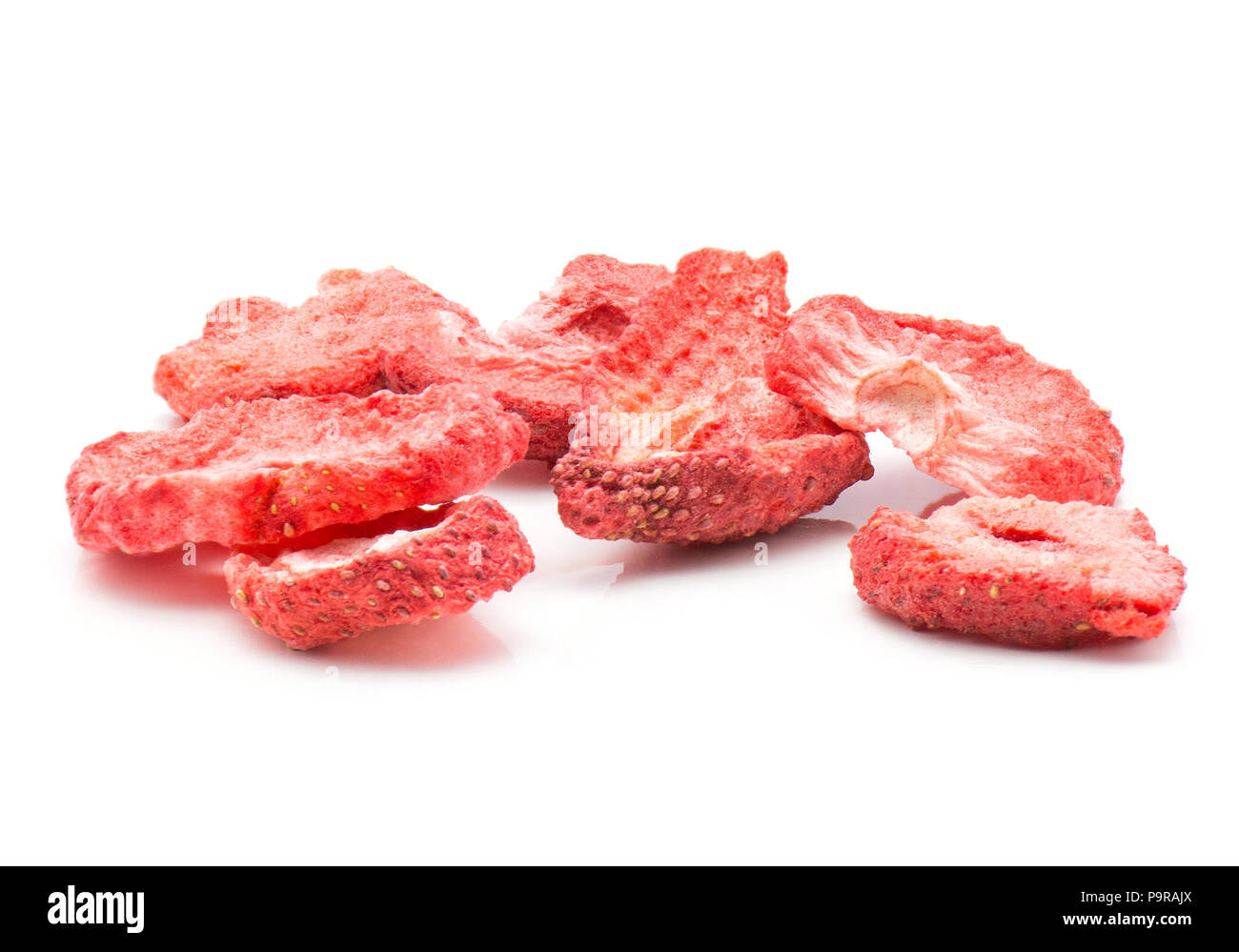 Freeze dried strawberries stack isolated on white background Stock Photo