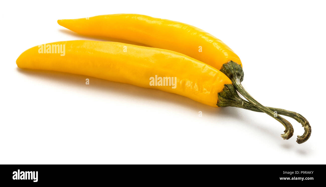 Pair of yellow Chili peppers isolated on white background Stock Photo ...