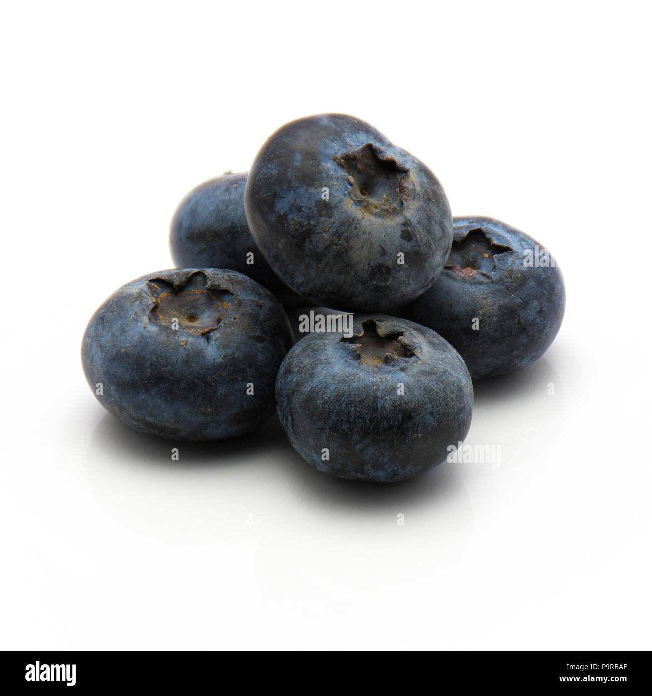 Bog blueberries isolated on white background heap of whole Stock Photo