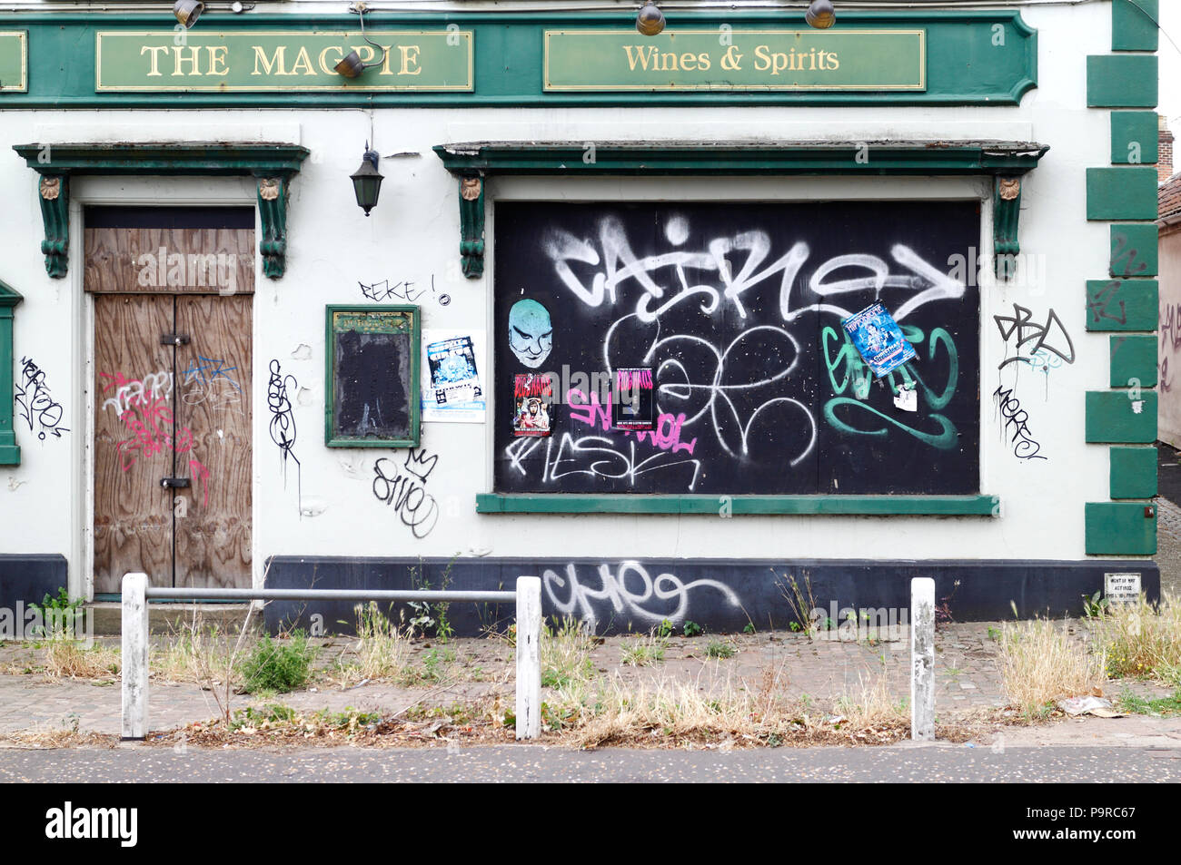 A closed and shuttered Public House daubed with graffiti in Norwich, Norfolk, England, United Kingdom, Europe. Stock Photo