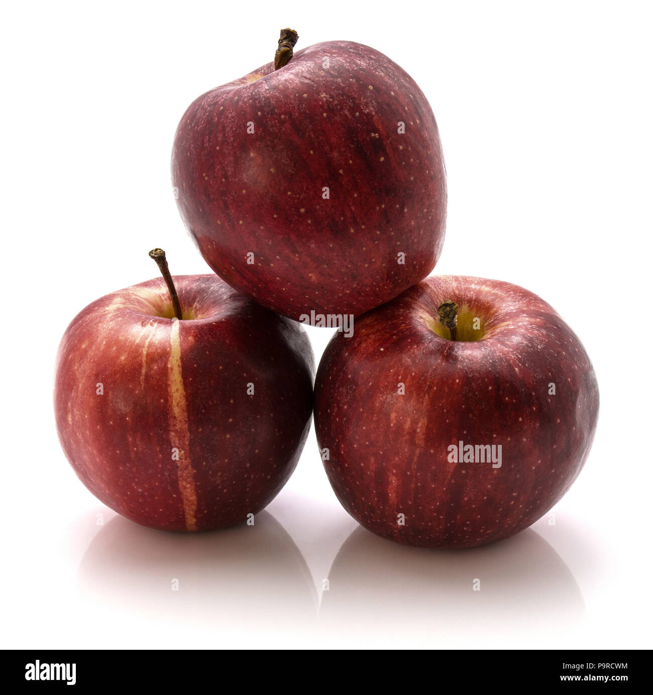 Three whole Gala apples isolated on white background Stock Photo