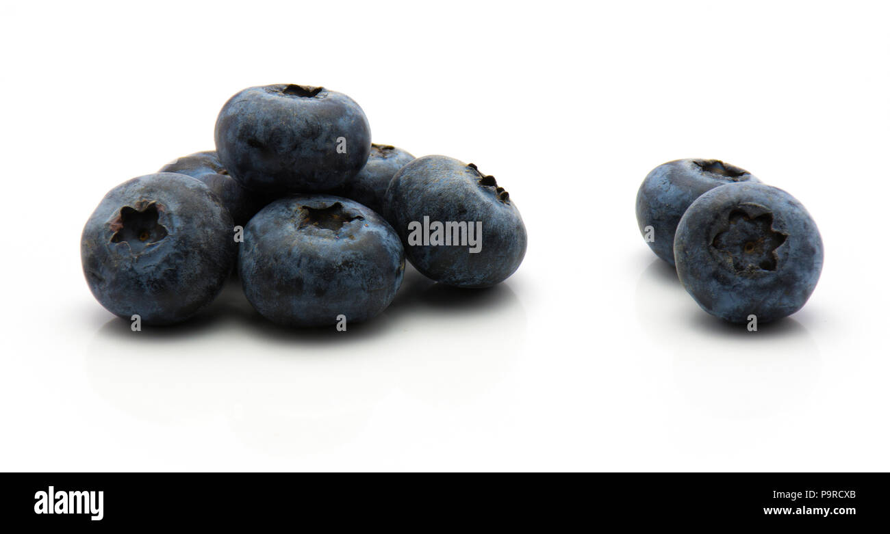 Bog blueberries isolated on white background fresh heap Stock Photo