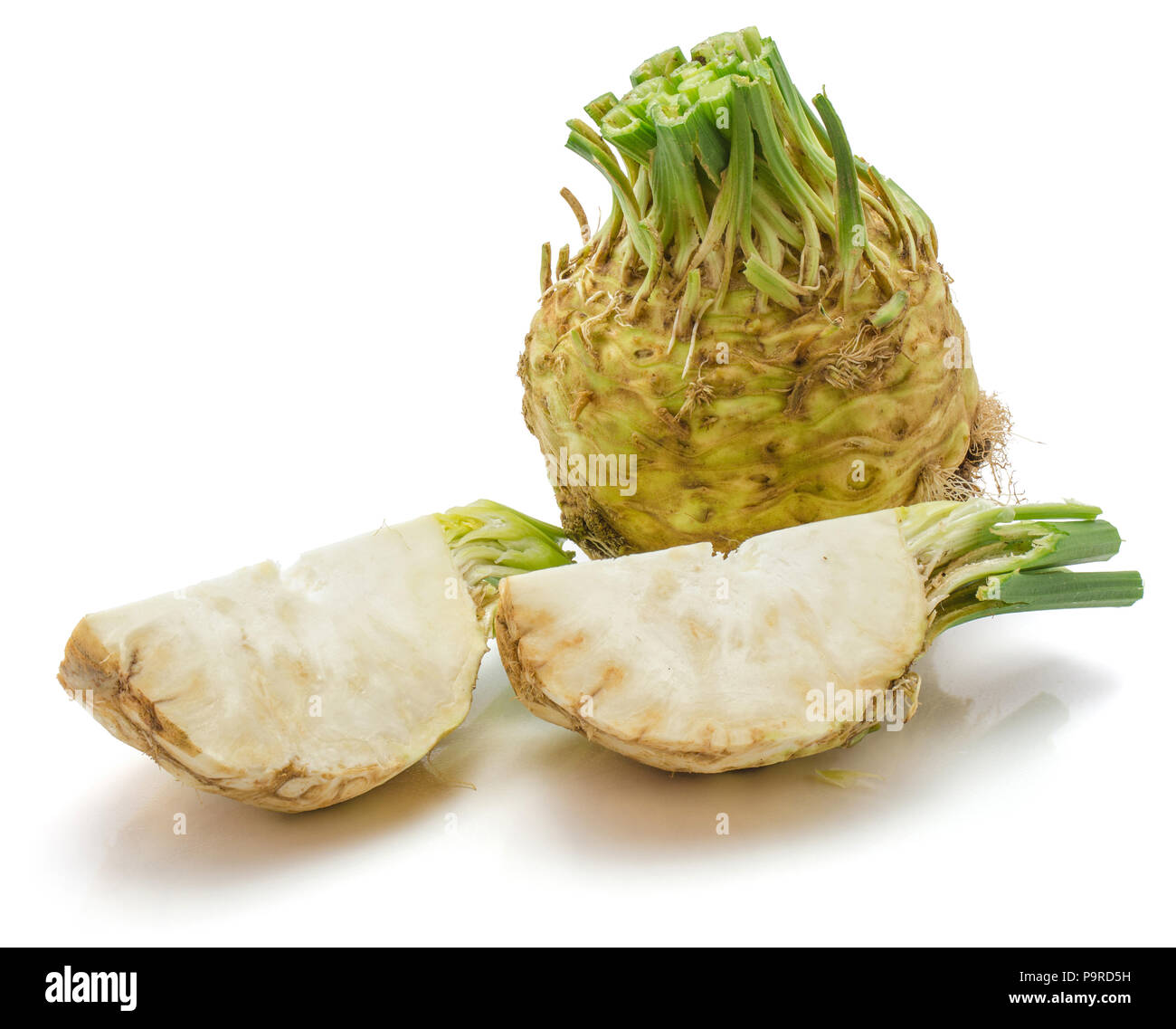 Fresh celery root isolated on white background one whole and two quarters Stock Photo