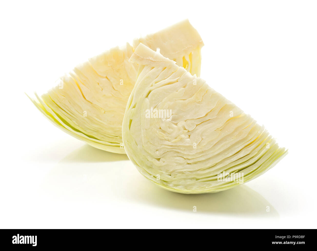Two white cabbage quarters isolated on white background Stock Photo Alamy