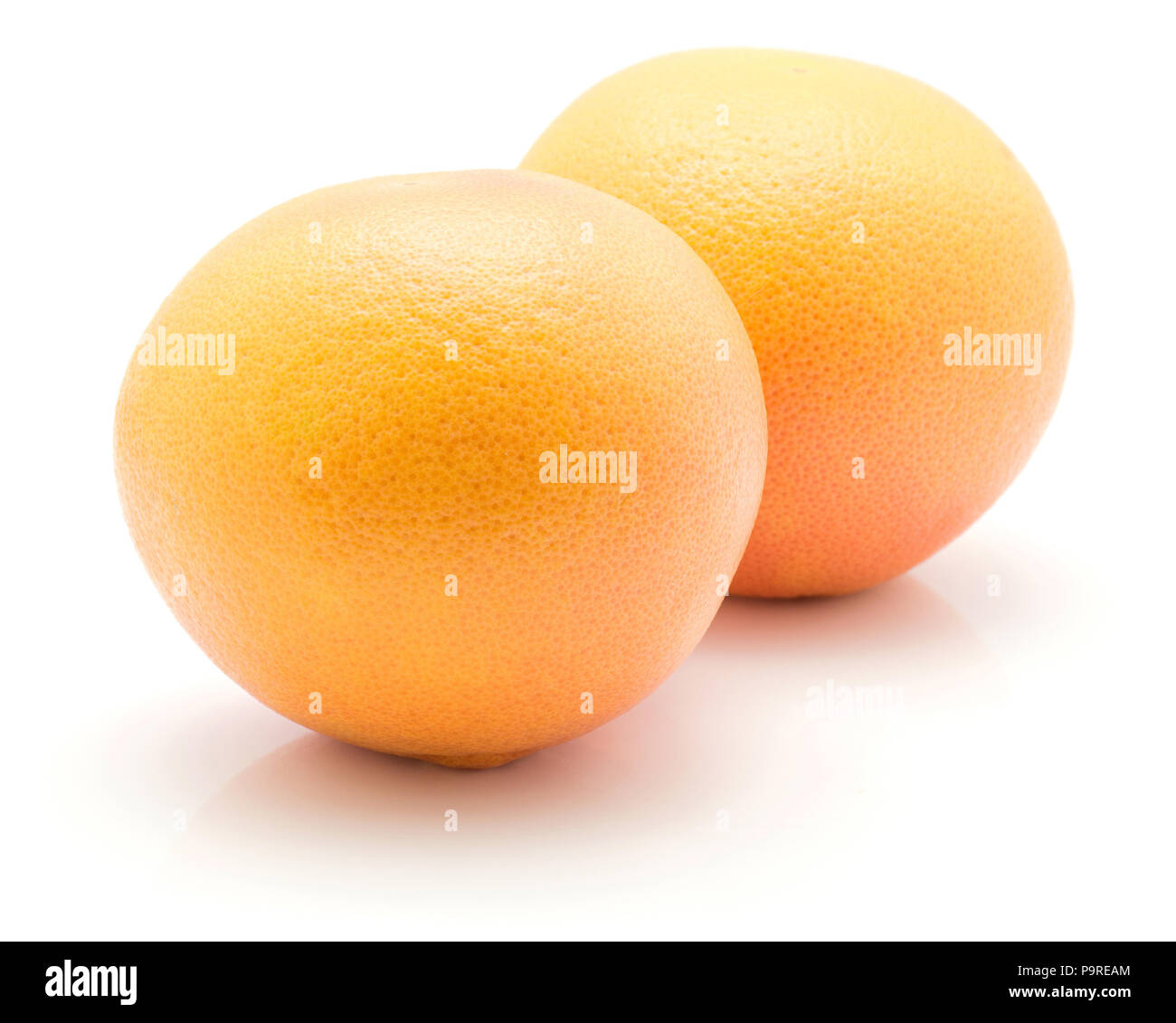 Two red grapefruits isolated on white background Stock Photo Alamy