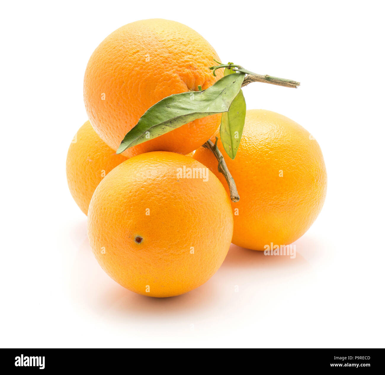 Oranges with green leaf isolated on white background Stock Photo