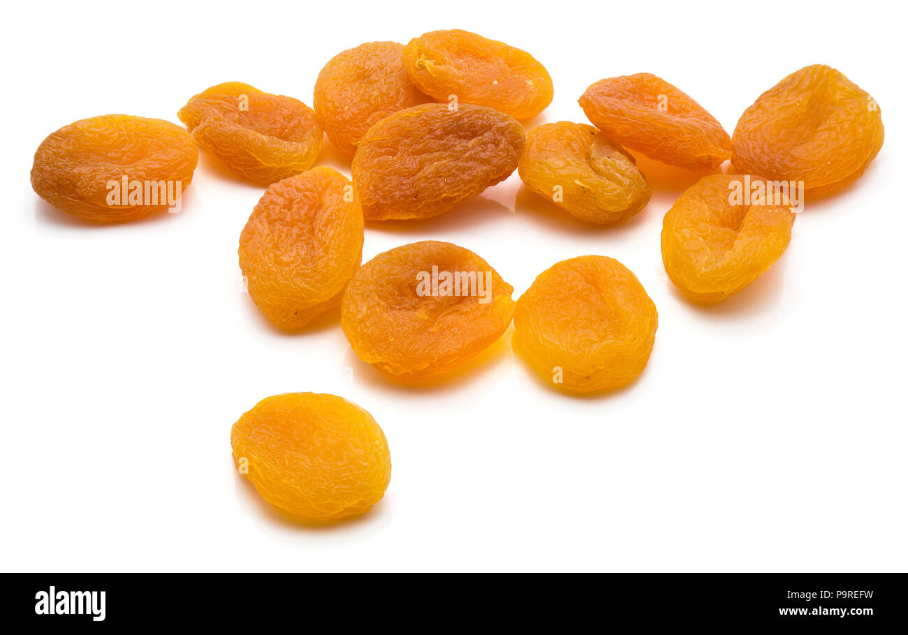 A lot of dried apricots isolated on white background Stock Photo Alamy