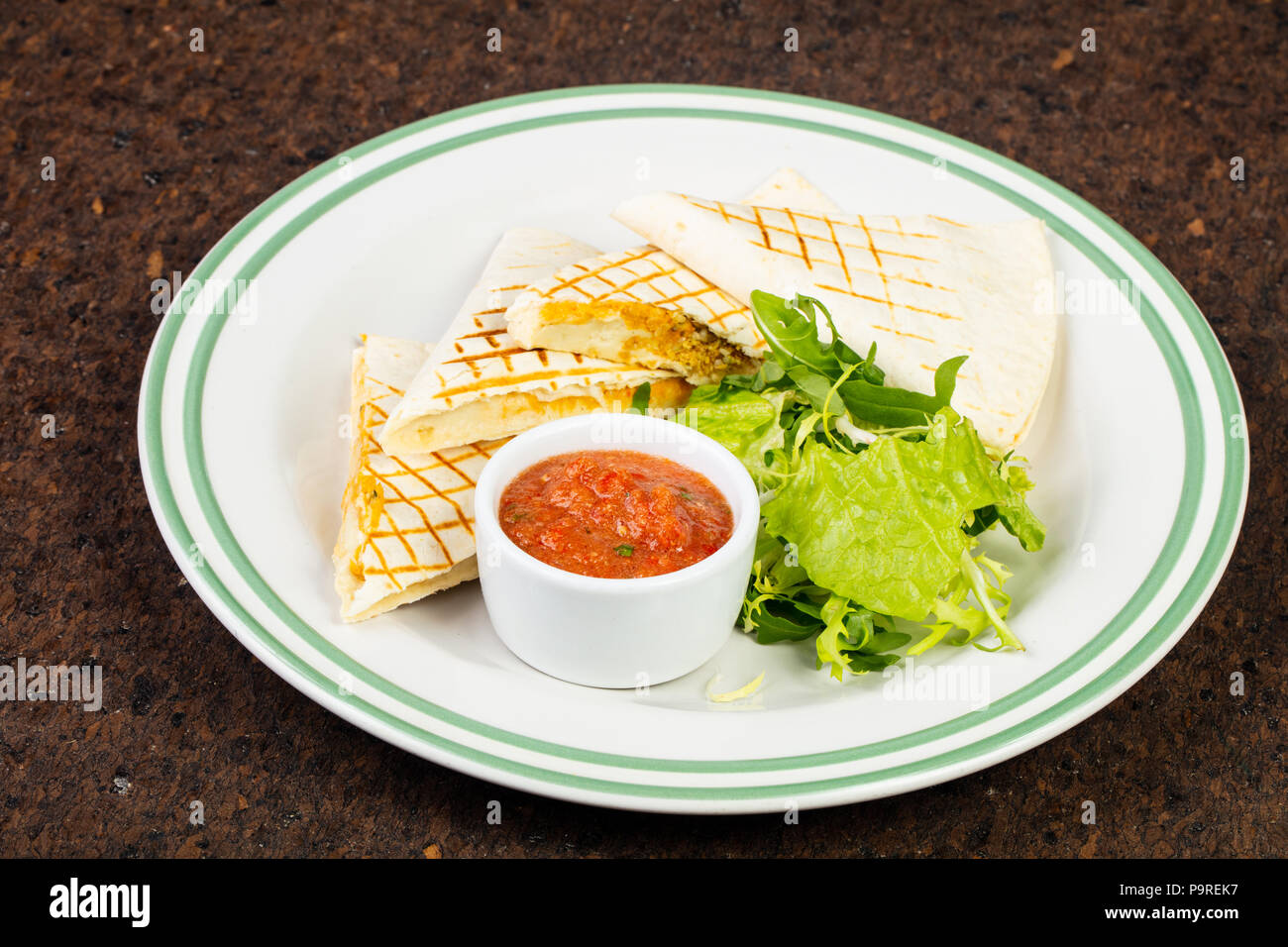 Delicious quesadilla pita with chili sauce Stock Photo Alamy