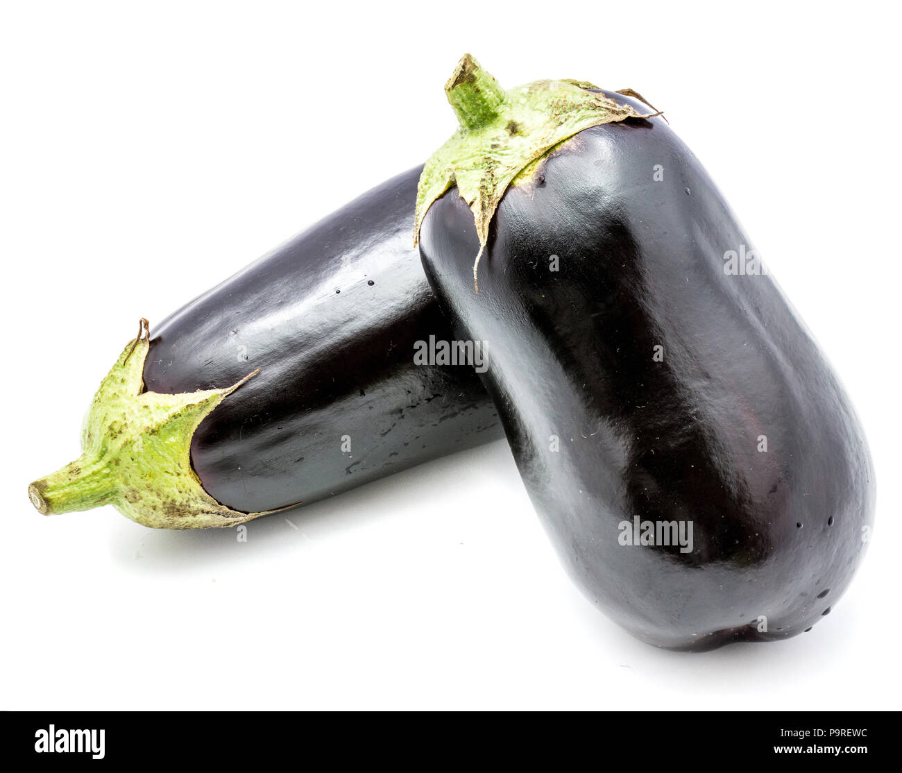 Two whole eggplants (aubergine) isolated on white background Stock