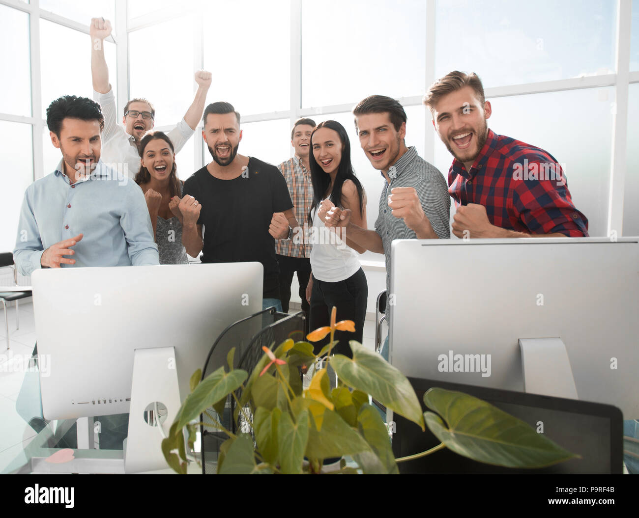 happy professional business team standing in modern office Stock Photo ...