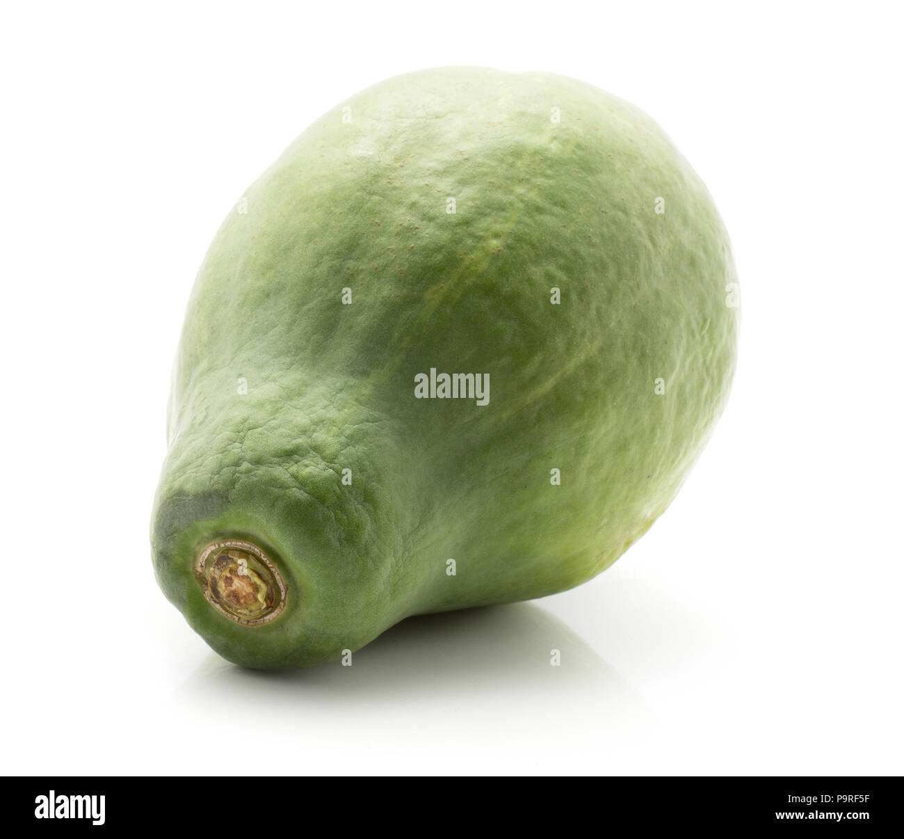 One green papaya (pawpaw, papaw) isolated on white background Stock Photo