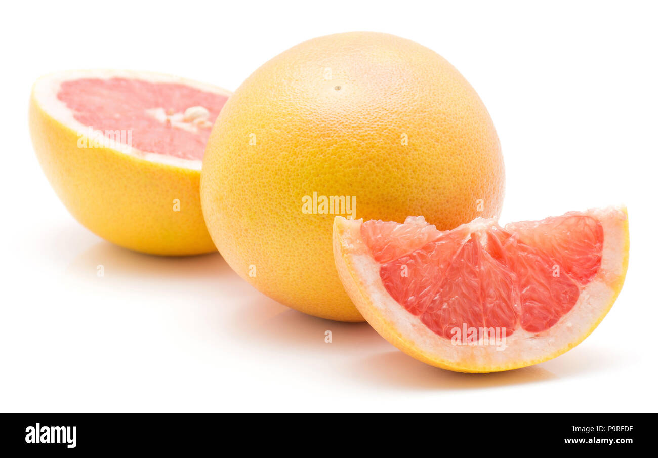 Red grapefruit isolated on white background one whole half and slice Stock Photo