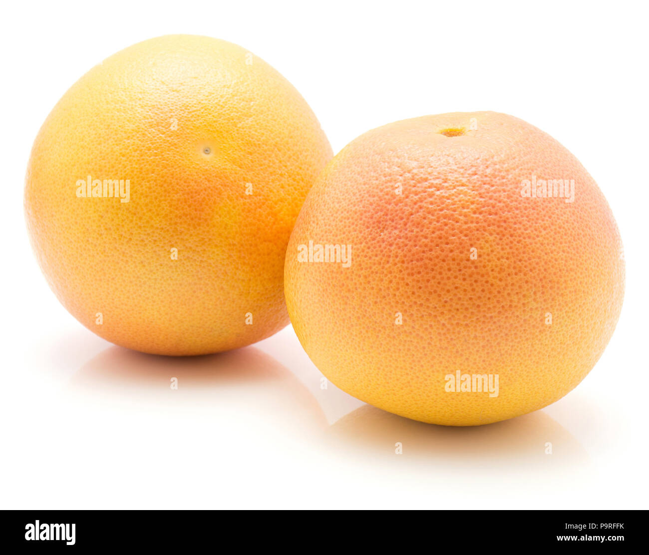 Red grapefruits isolated on white background two whole Stock Photo