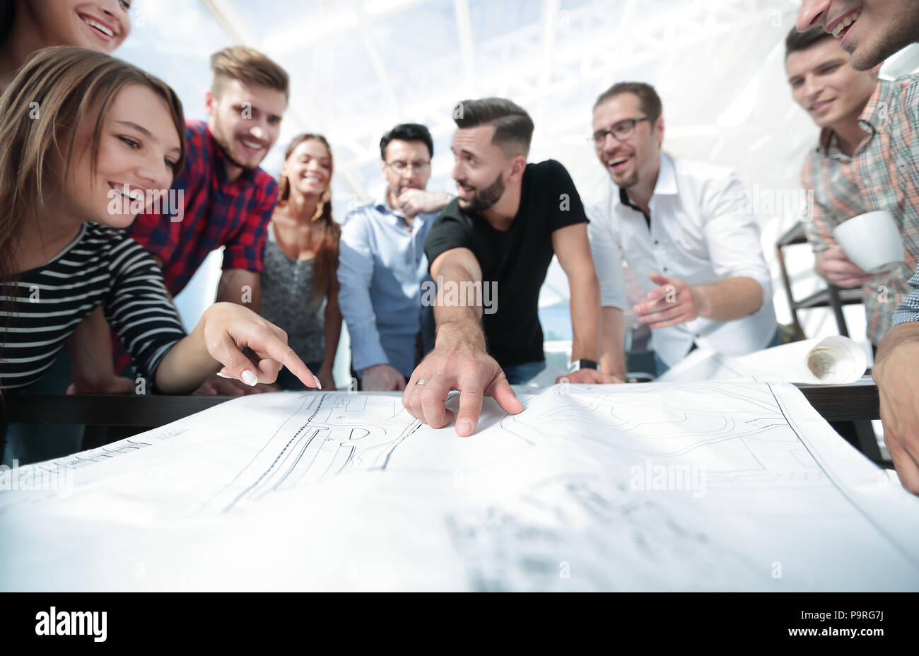 team of architects is discussing a new project Stock Photo