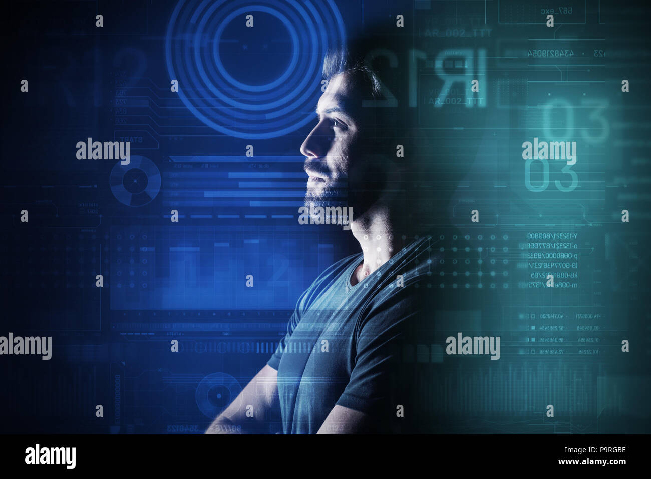 Thoughtful database administrator. Clever database administrator thoughtfully looking at the information on a transparent screen while working Stock Photo