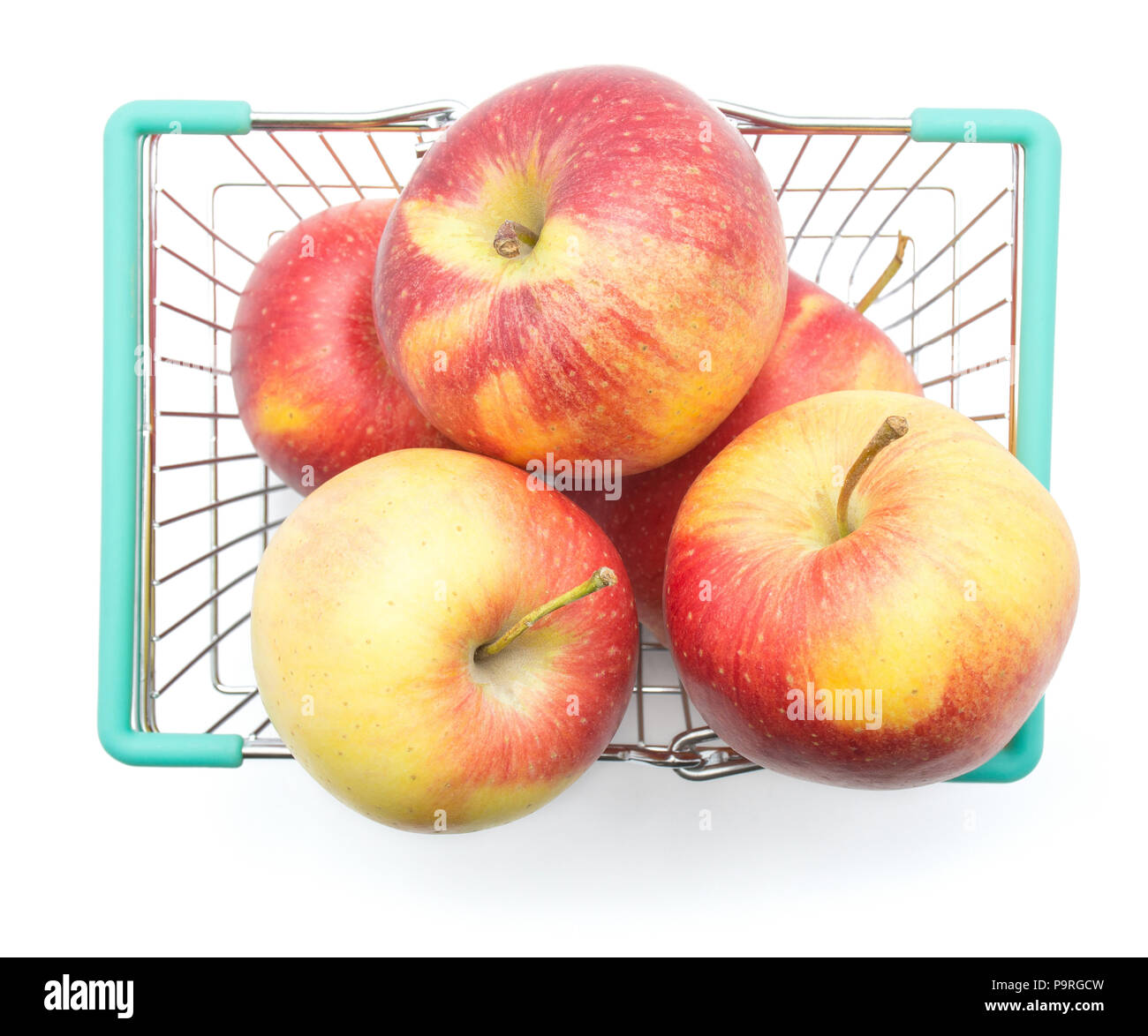 Five apples (Evelina variety) in a shopping basket top view isolated on