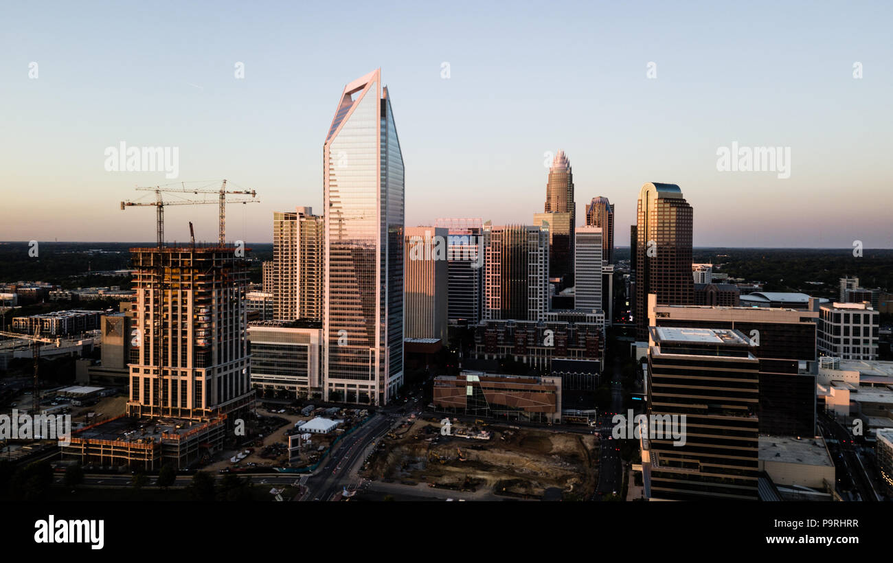 The city skyline is changing fast with new buildings under construction in Charlotte Stock Photo