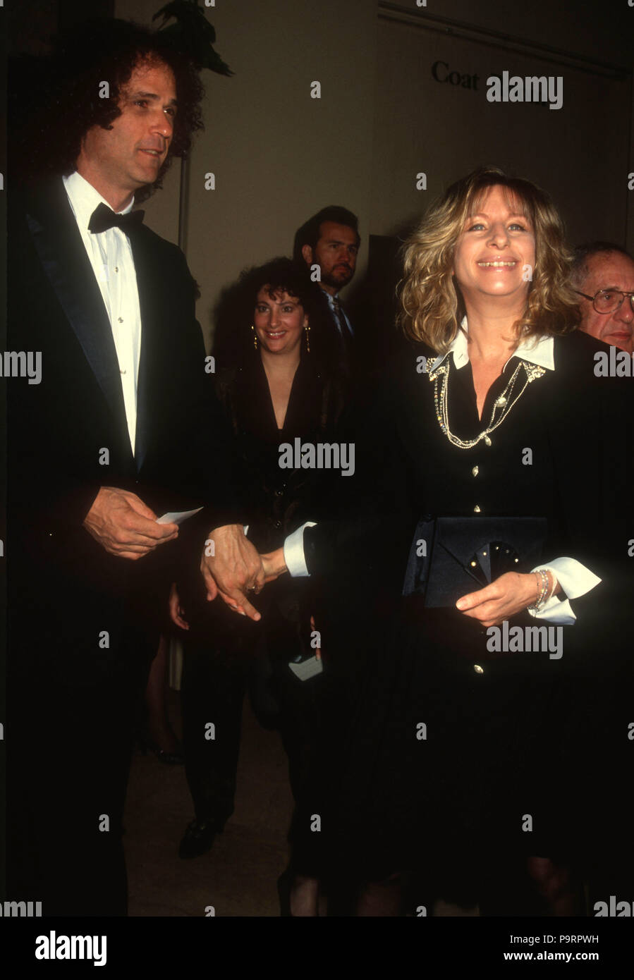 BEVERLY HILLS, CA - MARCH 22: (L-R) Composer Richard Baskin and Singer/actress Barbra Streisand attend the 44th Annual Writers Guild of America Awards on March 22, 1992 at the Beverly Hilton Hotel in Beverly Hills, California. Photo by Barry King/Alamy Stock Photo Stock Photo