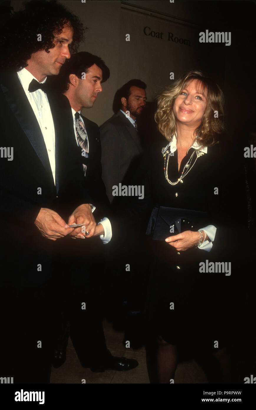 BEVERLY HILLS, CA - MARCH 22: (L-R) Composer Richard Baskin and Singer/actress Barbra Streisand attend the 44th Annual Writers Guild of America Awards on March 22, 1992 at the Beverly Hilton Hotel in Beverly Hills, California. Photo by Barry King/Alamy Stock Photo Stock Photo