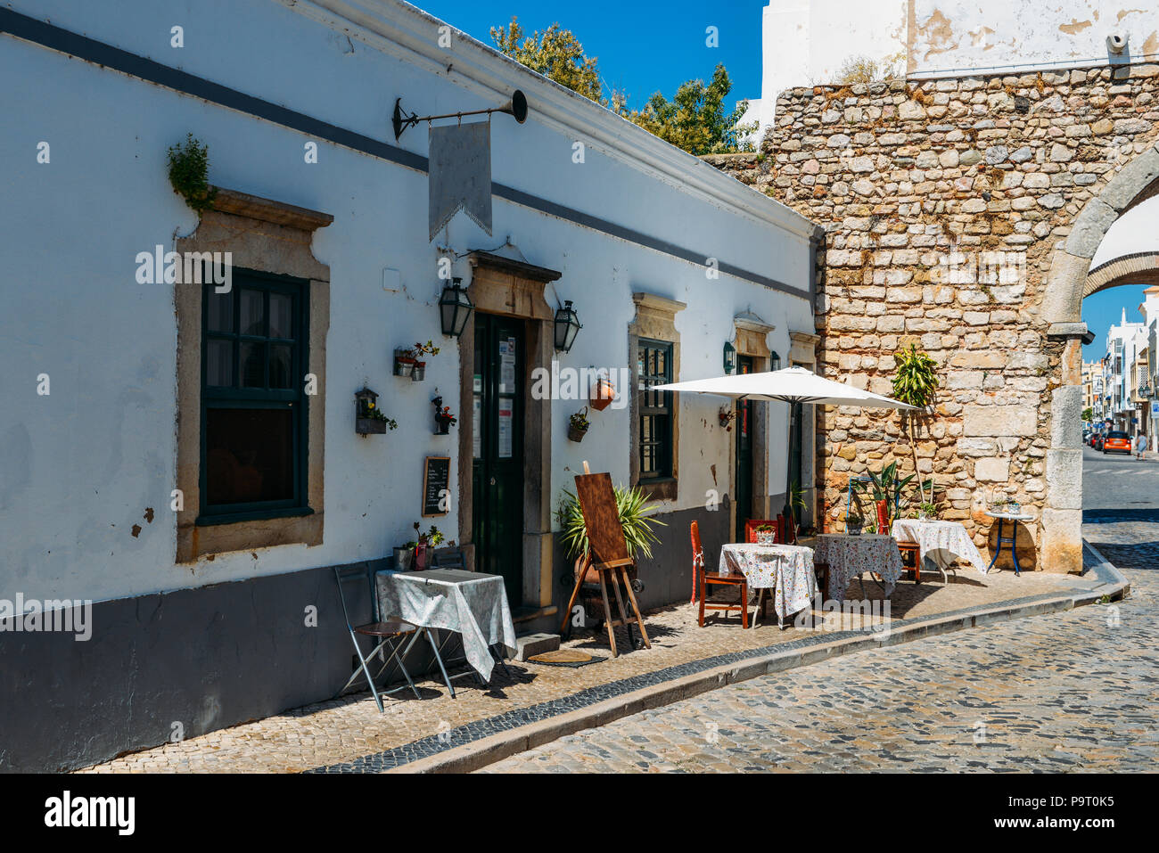 Restaurant terrace in the historic centre of Faro, Algarve, Portugal Stock Photo