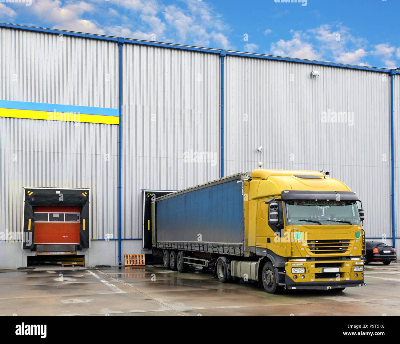 Cargo truck at warehouse building Stock Photo