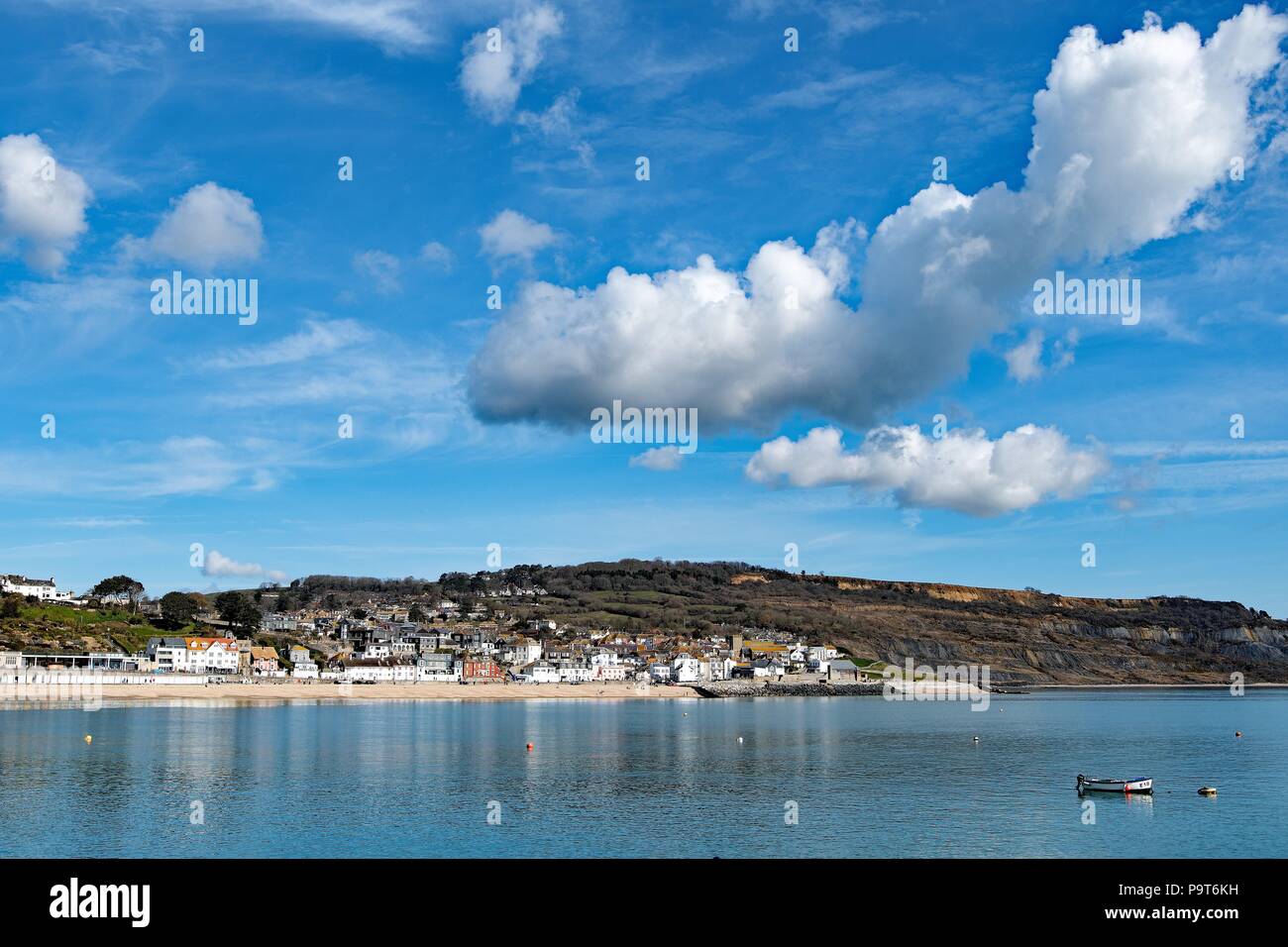 Taken to capture the town of Lyme Regis and an interesting cloud formation. Stock Photo