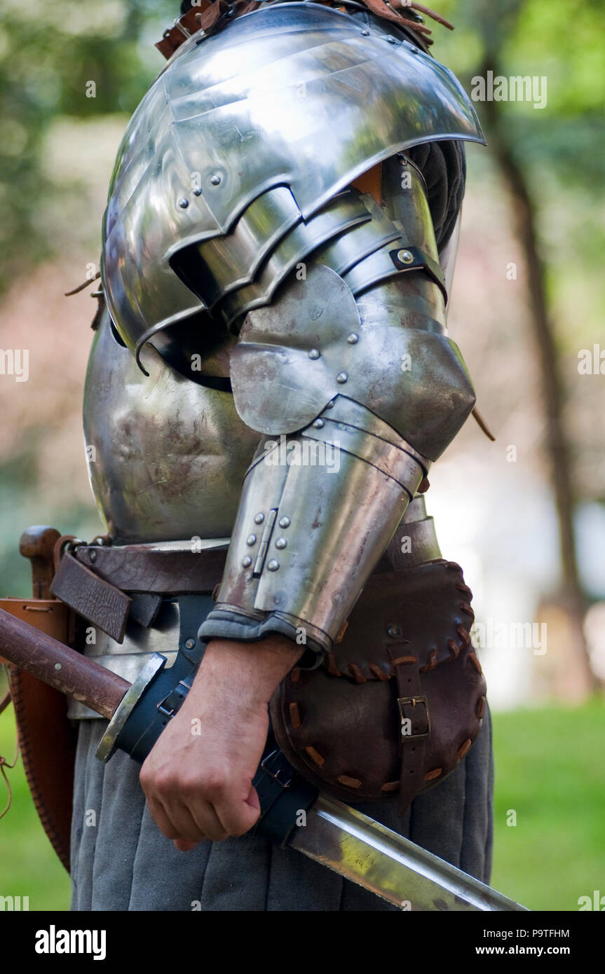Medieval Knight Dressing in Armor Stock Photo - Alamy