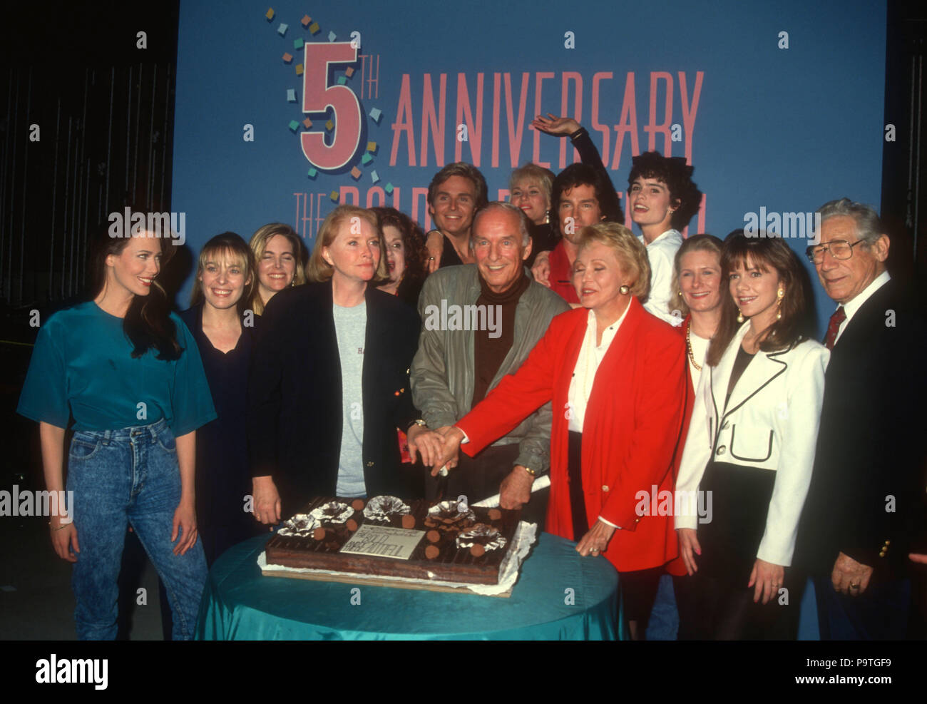 LOS ANGELES, CA - MARCH 23: Actress Hunter Tylo, actress Joanna Johnson, actress Susan Flannery, actor Jeff Trachta, creators William J. Bell and Lee Phillip Bell, actor Ronn Moss, actress Colleen Dion, actress Bobbie Eakes and guests attend 5th Anniversary Celebration for 'The Bold and the Beautiful' soap opera on March 23, 1992 at CBS Television City in Los Angeles, California. Photo by Barry King/Alamy Stock Photo Stock Photo