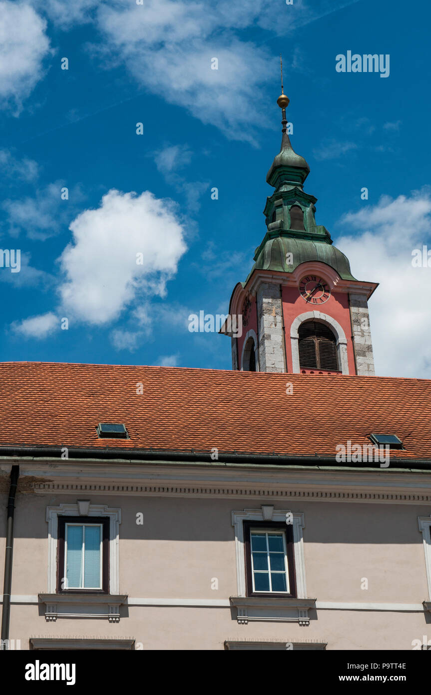 Slovenia: the bell tower of the Franciscan Church of the Annunciation, the parish church of Ljubljana built between 1646 and 1660 in Prešeren Square Stock Photo