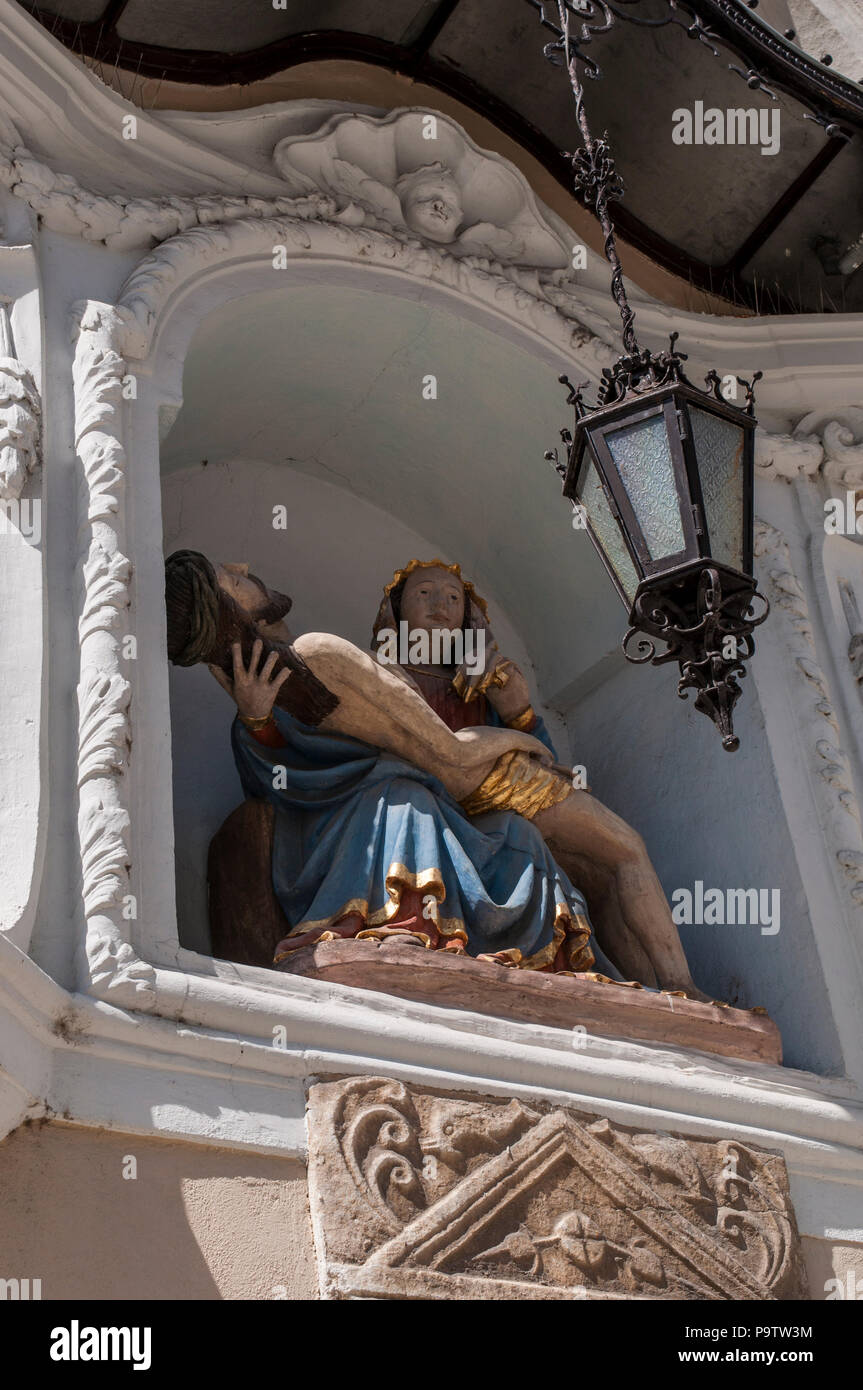 Slovenia: niche with a statue of the Virgin Mary and Jesus on the Ljubljana Cathedral, St. Nicholas's Church, a former Gothic church Stock Photo