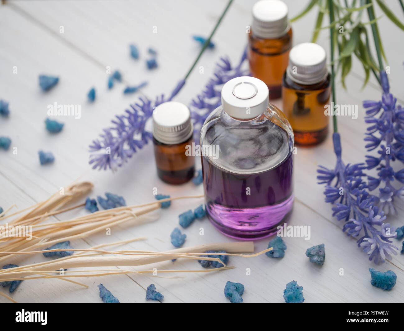 Lavender aroma, coffee aroma, orange and roses. On white wood floor Stock Photo