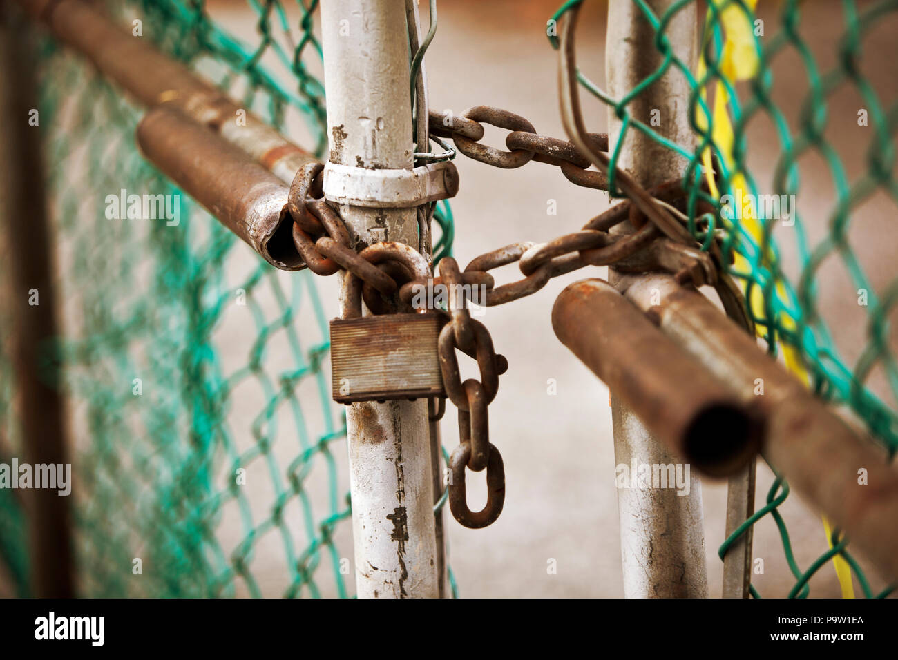 Gate lock with Rusty lock and chain Stock Photo