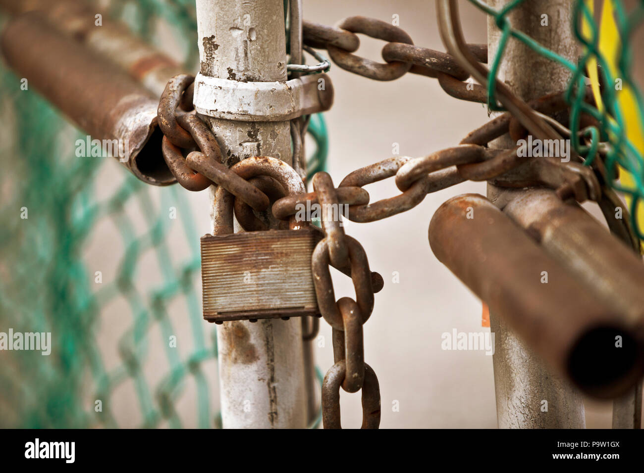 Gate lock with Rusty lock and chain Stock Photo