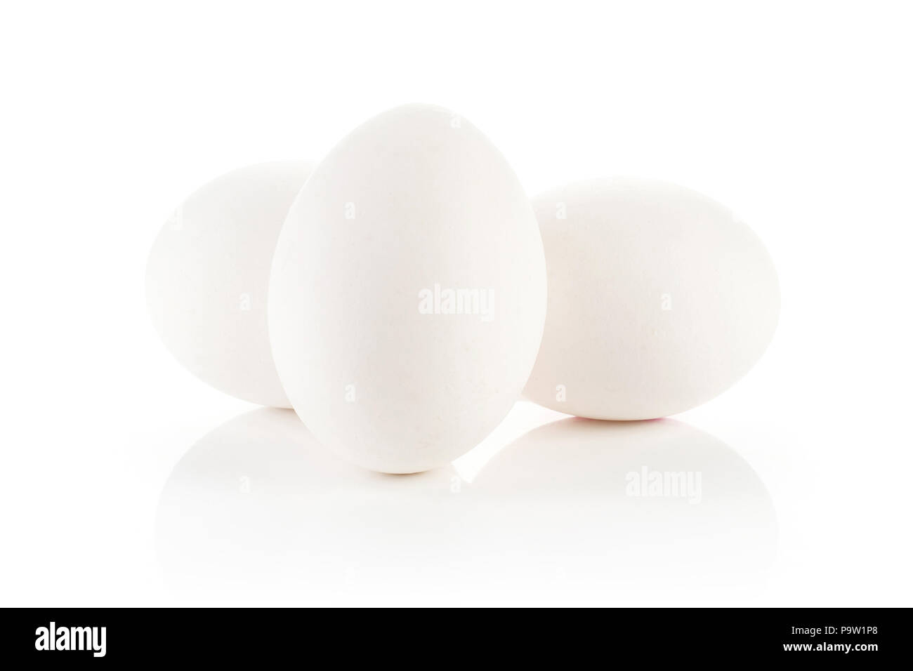 Three white chicken eggs stack isolated on white background Stock Photo ...