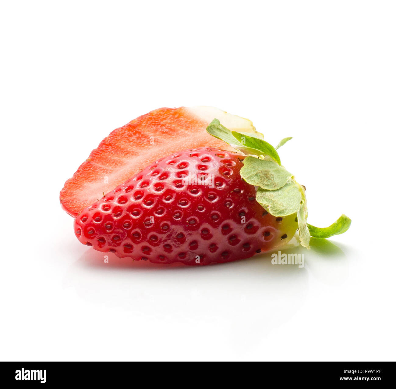 Sliced garden strawberry isolated on white background two halves Stock Photo