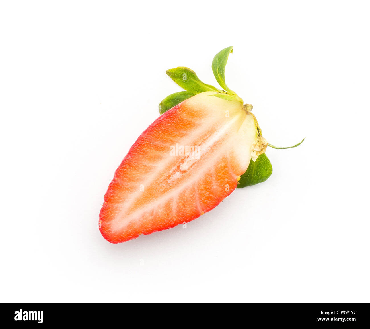 One garden strawberry cross section half top view isolated on white background fresh cut Stock Photo