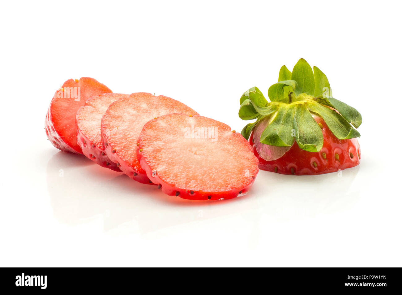 Sliced garden strawberry isolated on white background five round slices Stock Photo