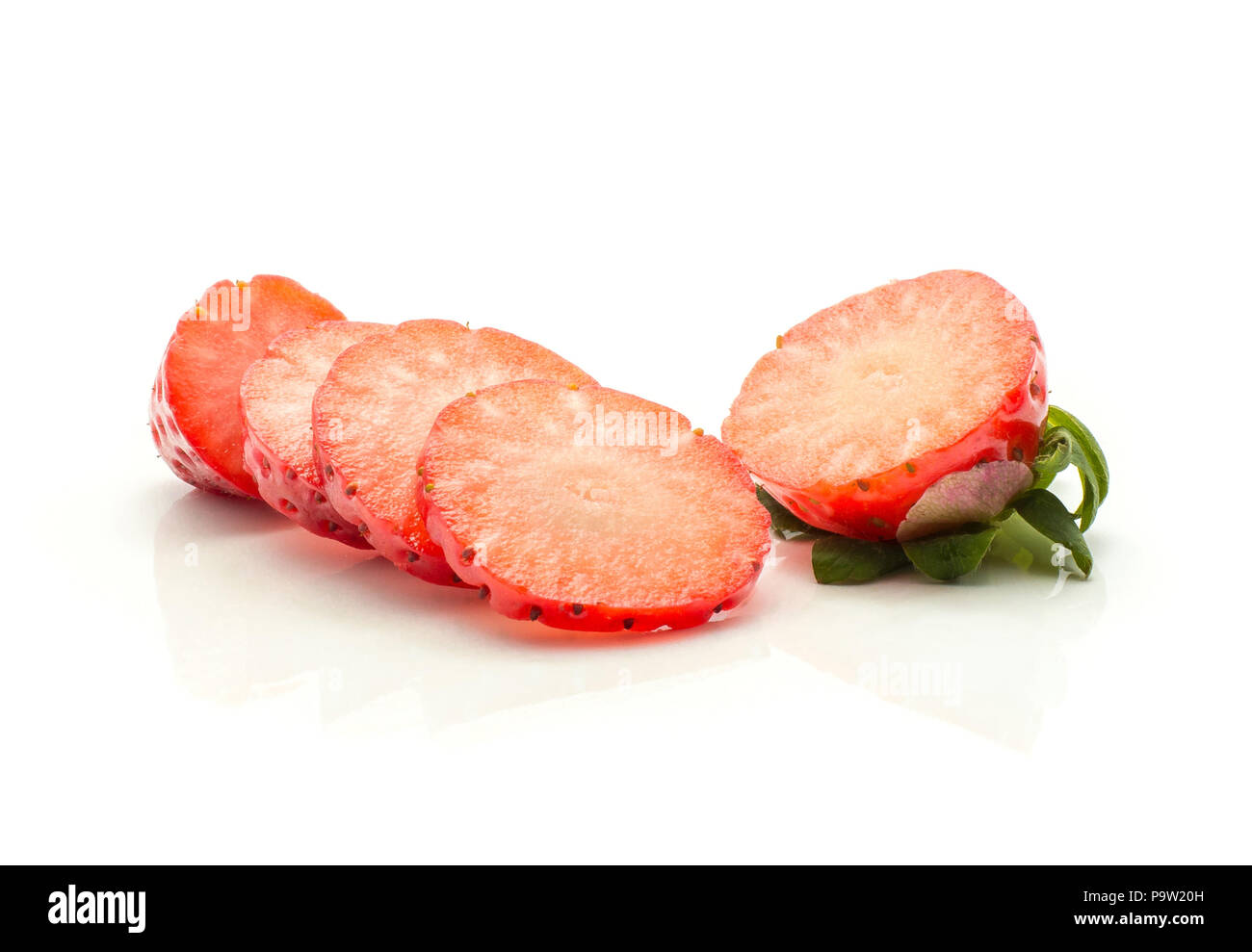 Sliced garden strawberry isolated on white background fresh cut five slices Stock Photo