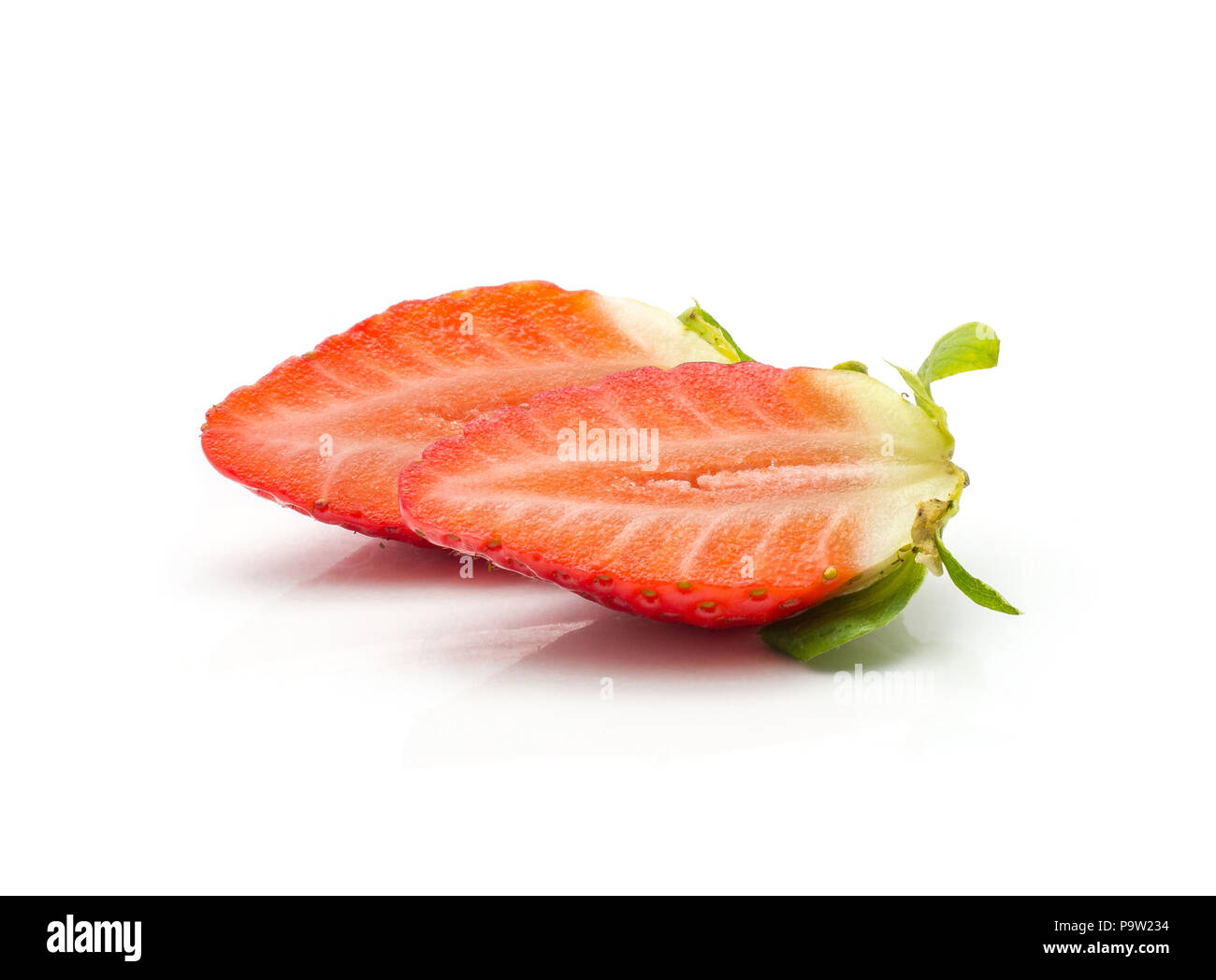 Sliced garden strawberry two halves isolated on white background Stock Photo