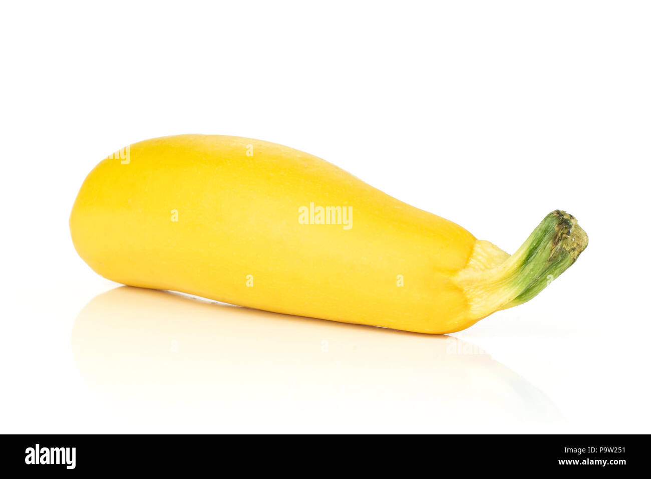 One whole raw yellow zucchini with a green stem isolated on white Stock Photo Alamy