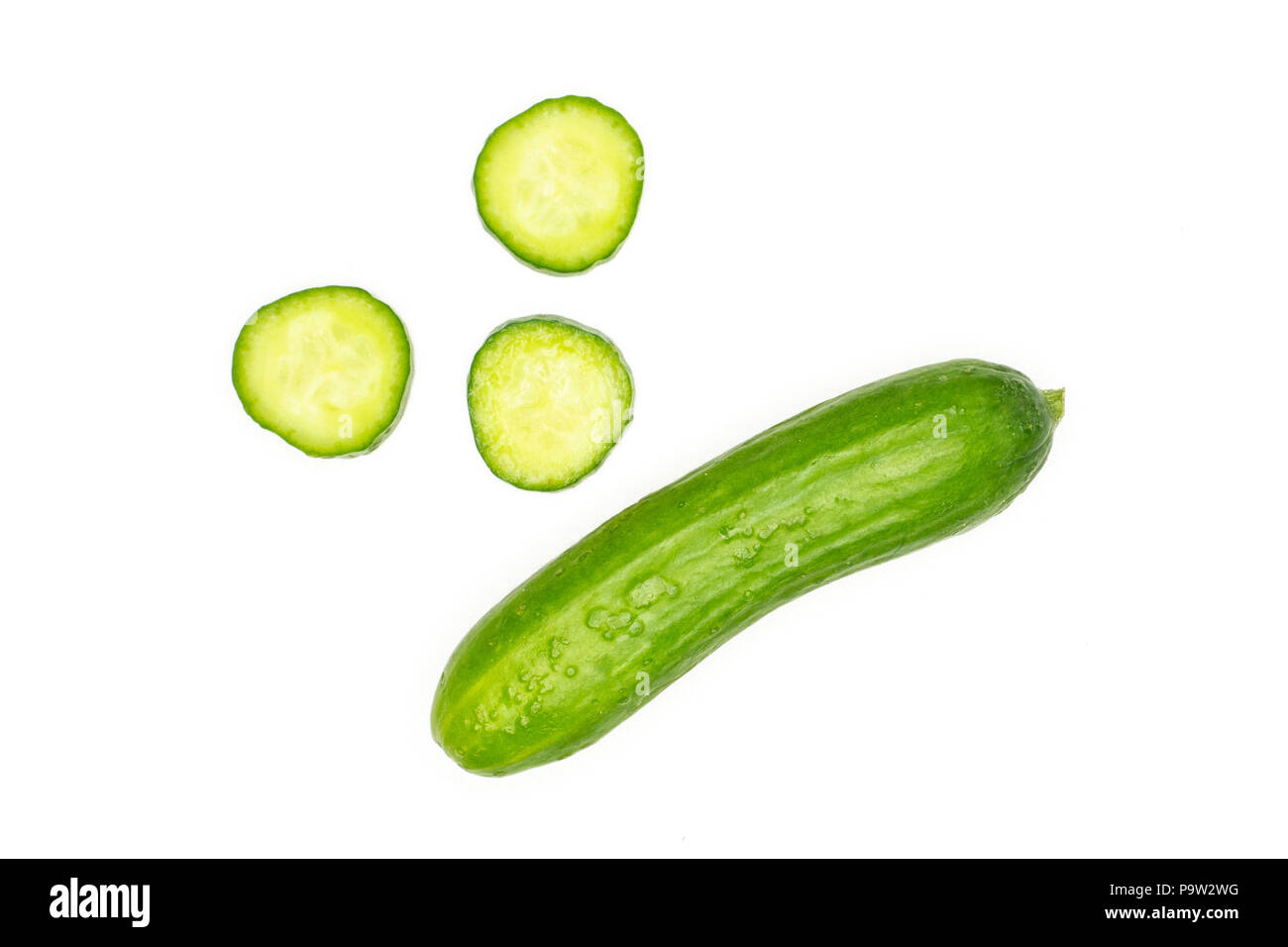 https://c8.alamy.com/comp/P9W2WG/one-fresh-mini-cucumber-and-three-round-slices-flatlay-isolated-on-white-background-P9W2WG.jpg
